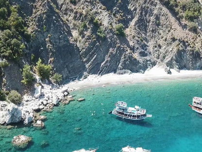 Suluada Island Boat Trip w/Lunch & Transfer