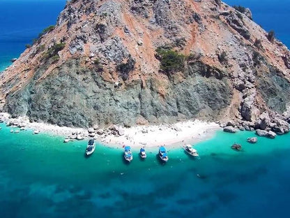 Suluada Island Boat Trip w/Lunch & Transfer