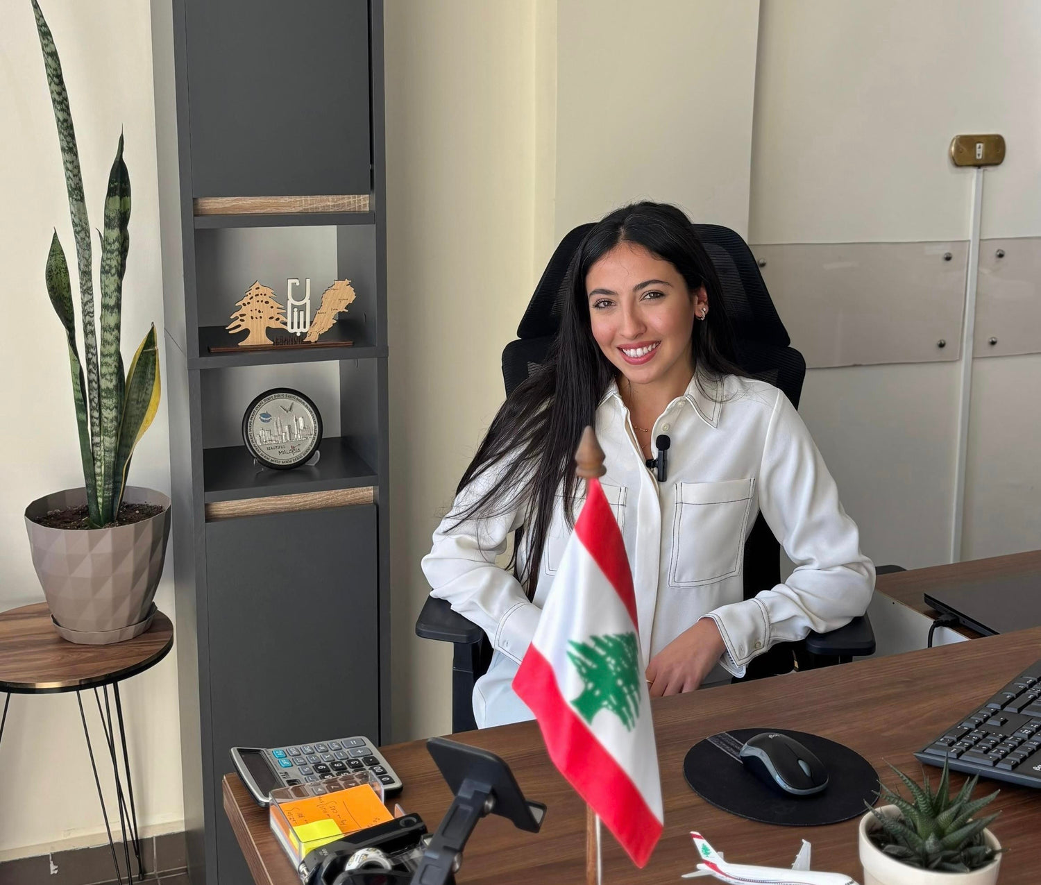ravel consultant assisting clients at the True Adventure Travel office in Mazboud, Lebanon, providing expert travel planning, holiday packages, visa assistance, and personalized travel services.