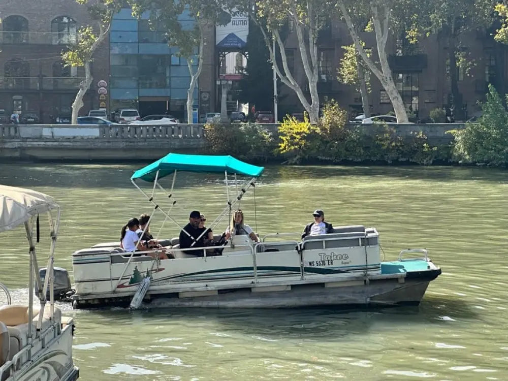 River Sightseeing Boat Ride with Welcome Drink